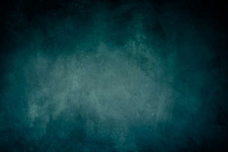 Grungy backdrop with dark vignette borders and texturesの写真素材