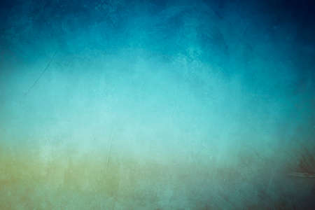 Grungy backdrop with dark vignette borders and texturesの写真素材