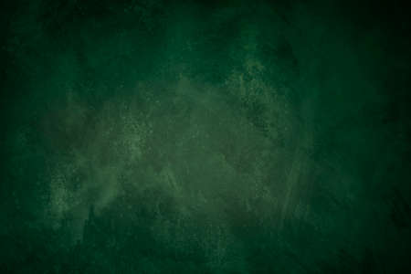 Grungy backdrop with dark vignette borders and texturesの写真素材