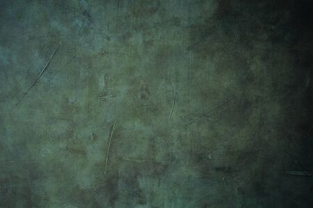Old canvas grungy backdrop with dark vignette bordersの写真素材