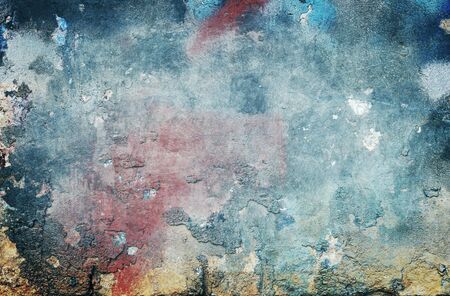 Old grungy stained blue wallの写真素材