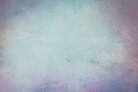 Blue grungy backdrop with dark bordersの写真素材