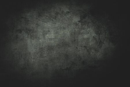Dark grungy backdrop with black bordersの写真素材