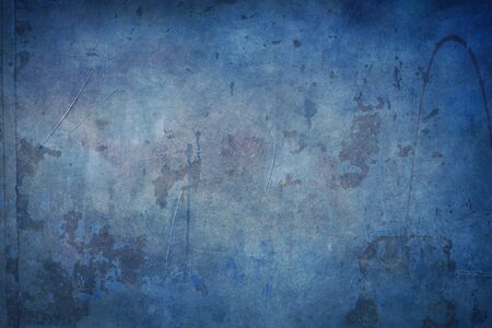 Blue grungy backdrop with black bordersの写真素材