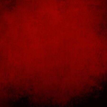 Red grungy backdrop with black bordersの写真素材