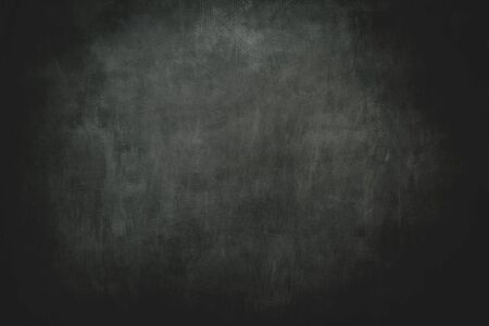 Dark grungy backdrop with black bordersの写真素材