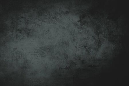 Old dark grungy wall backdropの写真素材