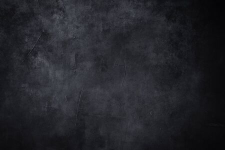 Dark grungy backdrop with textureの写真素材