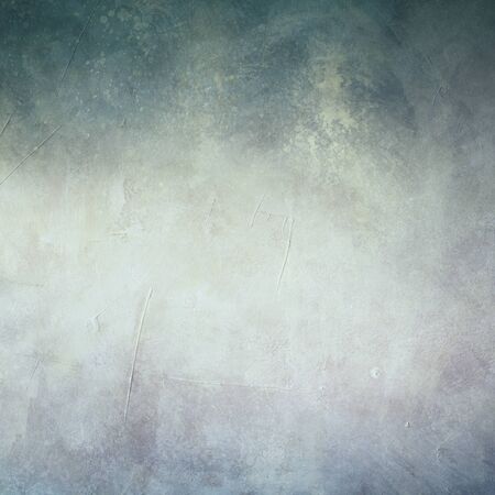 Blue grungy backdrop with dark bordersの写真素材