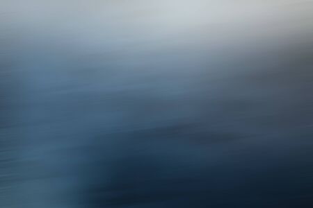 Dark blue motion blur abstract backgroundの写真素材
