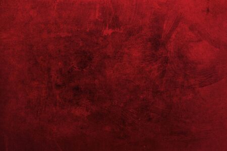 Red grungy backdrop with textureの写真素材