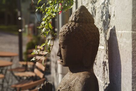 Gautama buddha decorative stone statueの写真素材