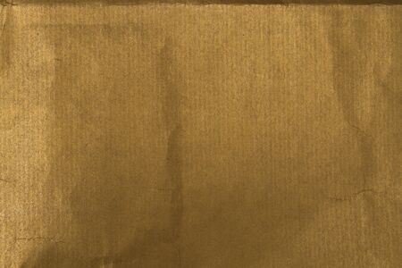 golden craft paper texture or backgroundの写真素材