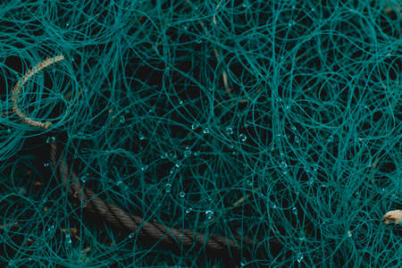 Old fishing nets close upの写真素材
