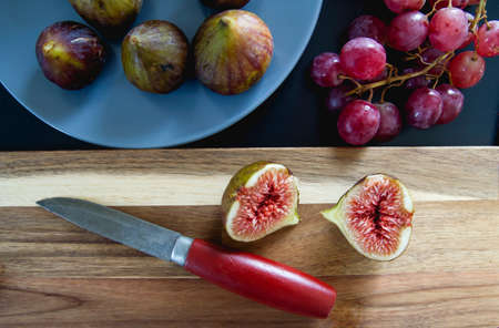 Fresh figs and red grapesの写真素材