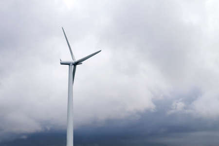 Wind turbines generating clean renewable green energy, environmental concept, copy spaceの写真素材
