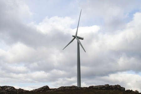 Wind turbines generating clean renewable green energy, environmental concept, copy spaceの写真素材