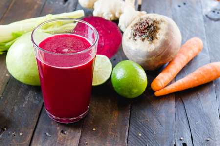 Healthy homemade detox beetroot drink with fresh fruits and vegetablesの写真素材