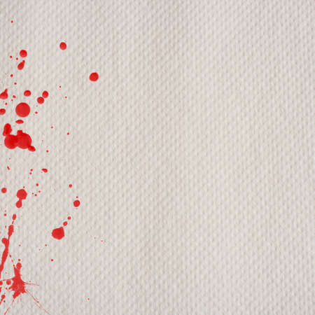 Blood stains on a paperの写真素材