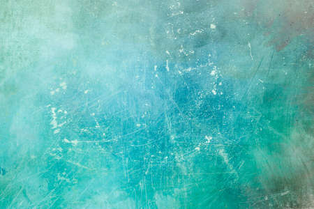 Blue-green grrungy scraped backdrop or textureの写真素材