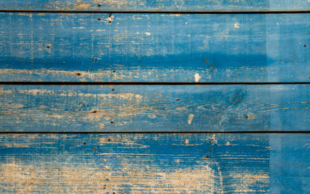 Old blue painted wooden planks wall background or textureの写真素材