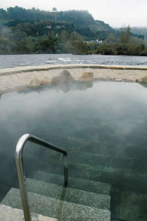 Hot springs Muino da Veiga, pools in Minho riverbed in Ourense, Spainの写真素材