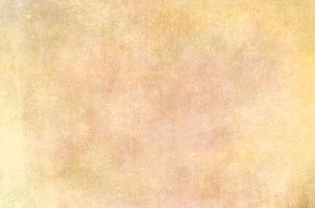 Cream colored worn backdrop, grunge background or textureの写真素材