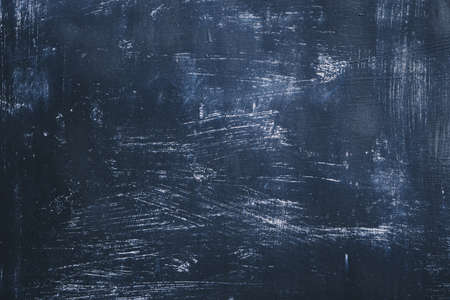 Old worn blue painted metal sheet grunge background or textureの写真素材