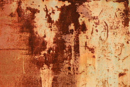 Old worn corroded metal with peeling paint, grunge background or textureの写真素材