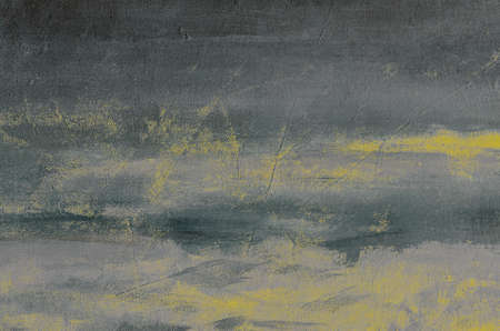 Grey abstract painting with yellow stains, grunge background or textureの写真素材
