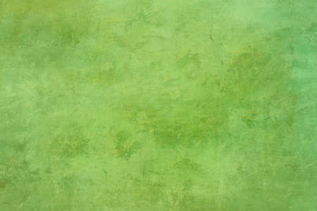 Lime green splattered backdrop, grunge background or textureの写真素材