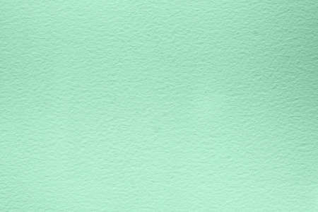 Pale green fine paper sheet textureの写真素材