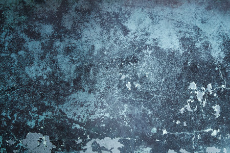 Old blue plaster wall with peeling paint, grunge background or textureの写真素材