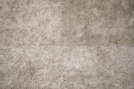 Gray cement plaster wall rough grungy texture or backgroundの写真素材