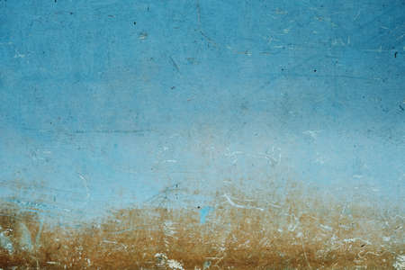 Worn out old blue painted grunge background or textureの写真素材