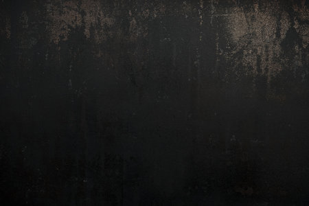 Worn out rusted black metal texture grunge backgroundの写真素材