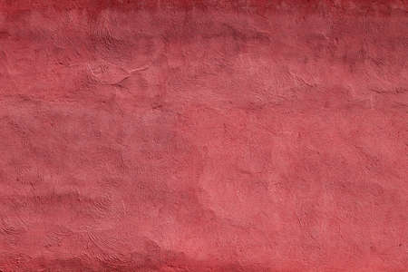 Red stucco finish plaser wall texture or backgroundの写真素材