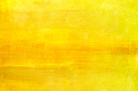 Yellow canvas painting background or textureの写真素材