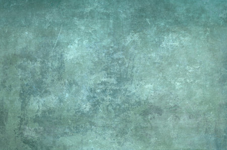 Worn out pale green grunge background or textureの写真素材