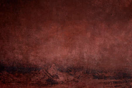 Distressed red wall, worn out grungy background or textureの写真素材