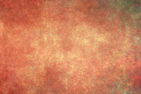 Worn out rusty red stucco wall grungy background or textureの写真素材