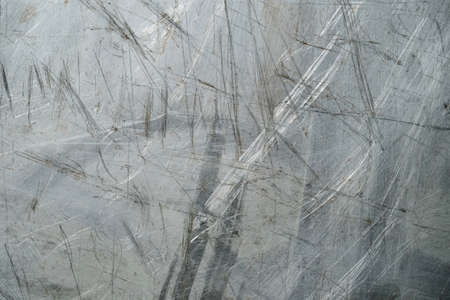 Old scratched metallic sheet grunge background or textureの写真素材