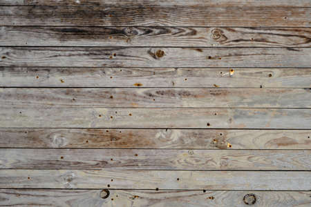 Old distressed wooden planks wall rustic background or textureの写真素材