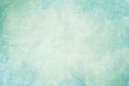 Old distressed pale blue wall grunge background or textureの写真素材