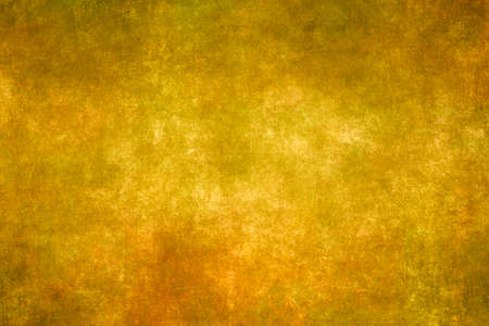 Ochre yellow venetian stucco wall backdrop grunge background or textureの写真素材