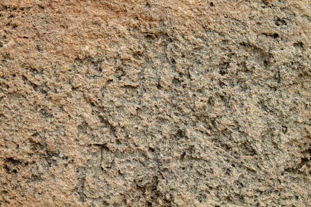 Detail of rough and porous sandstone wall textureの写真素材