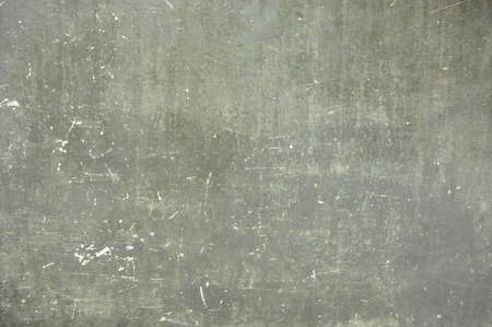 Old scratched metal texture, grunge worn out backdrop or textureの写真素材
