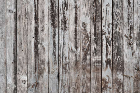 Old weathered wooden planks wall rustic background or textureの写真素材