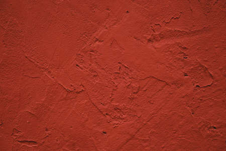 Red plaster finish wall texture detailの写真素材