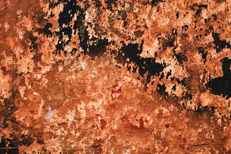 Old ruin wall with peeling paint, grunge background or textureの写真素材